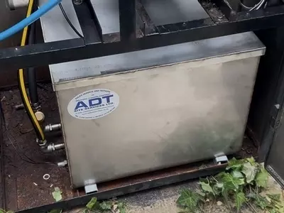 New stainless steel inlet water tank installed on a cold pressure washer system at a food factory in Mansfield. Replaced a deformed plastic tank to handle hot water feed, reduce condensation, and improve overall system reliability and hygiene.
